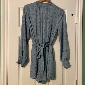 Long sleeve romper. Baby blue with navy/black splatter